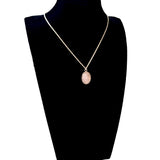 Pendentif en quartz rose serti