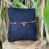 Bracelet nacre avec cristal de Swarovski rouge